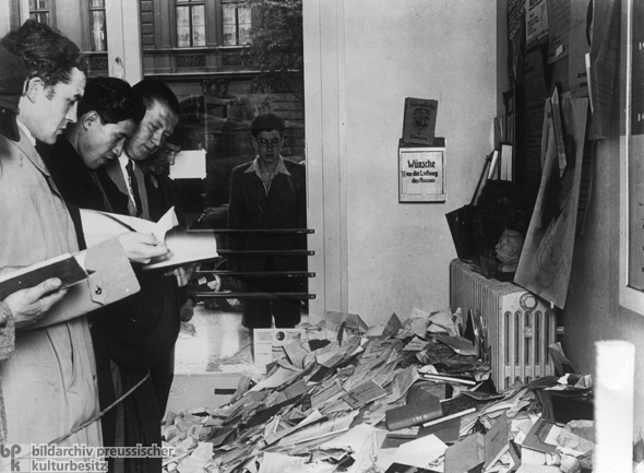 Institute for Sexual Research in Berlin: "Un-German" and "Unnatural" Literature is Sorted Out for the Book-Burning Ceremony (undated photo, May 6-10, 1933)